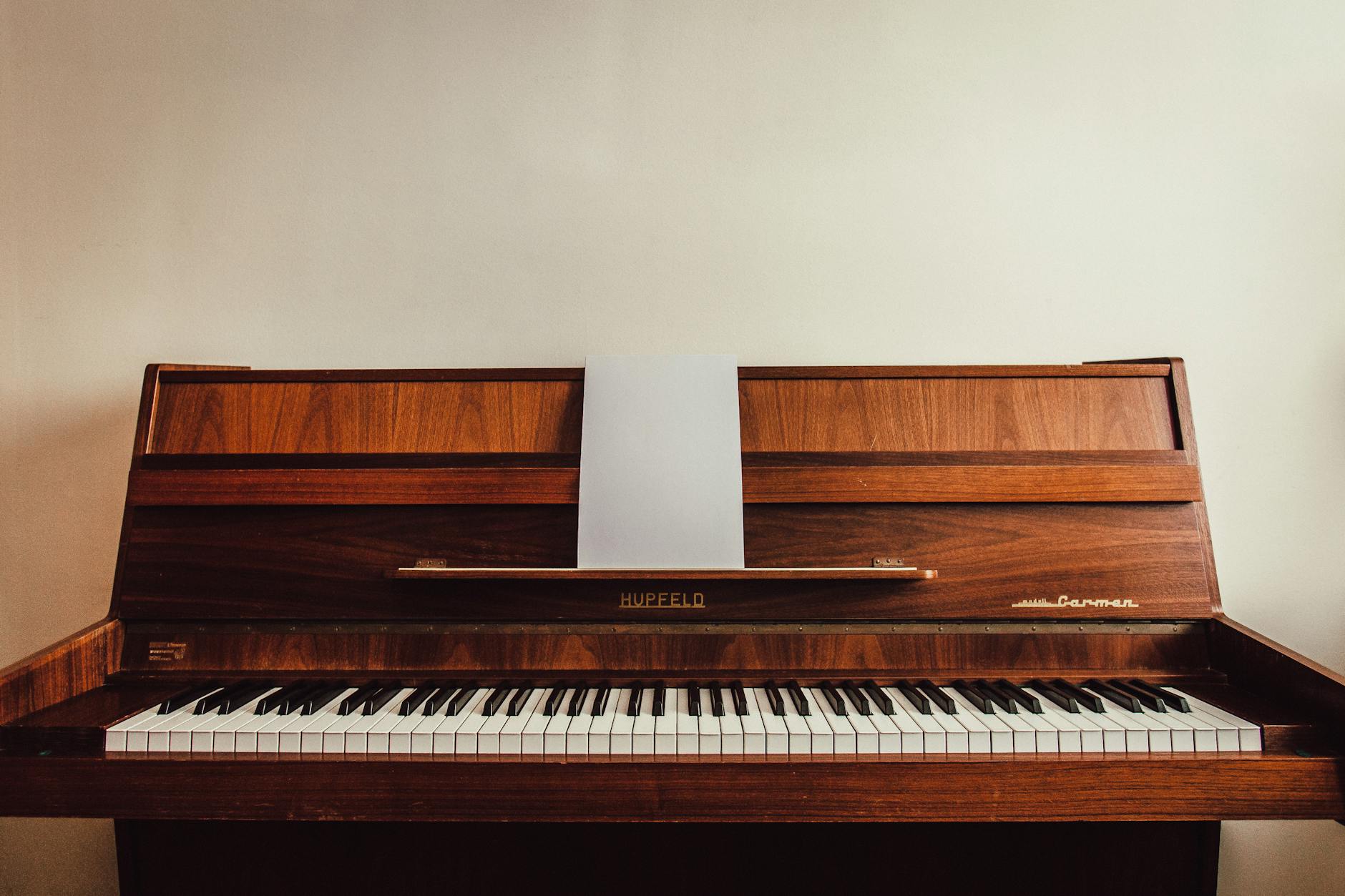brown upright piano