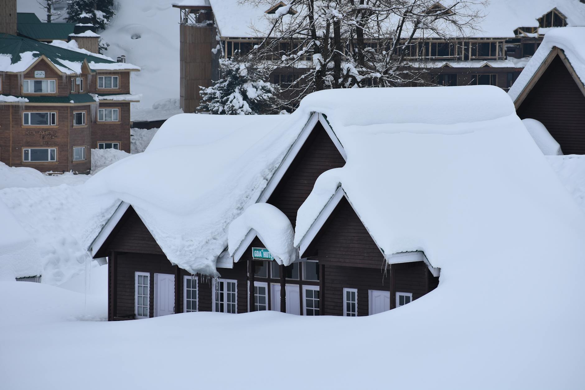 snow covered building with windows