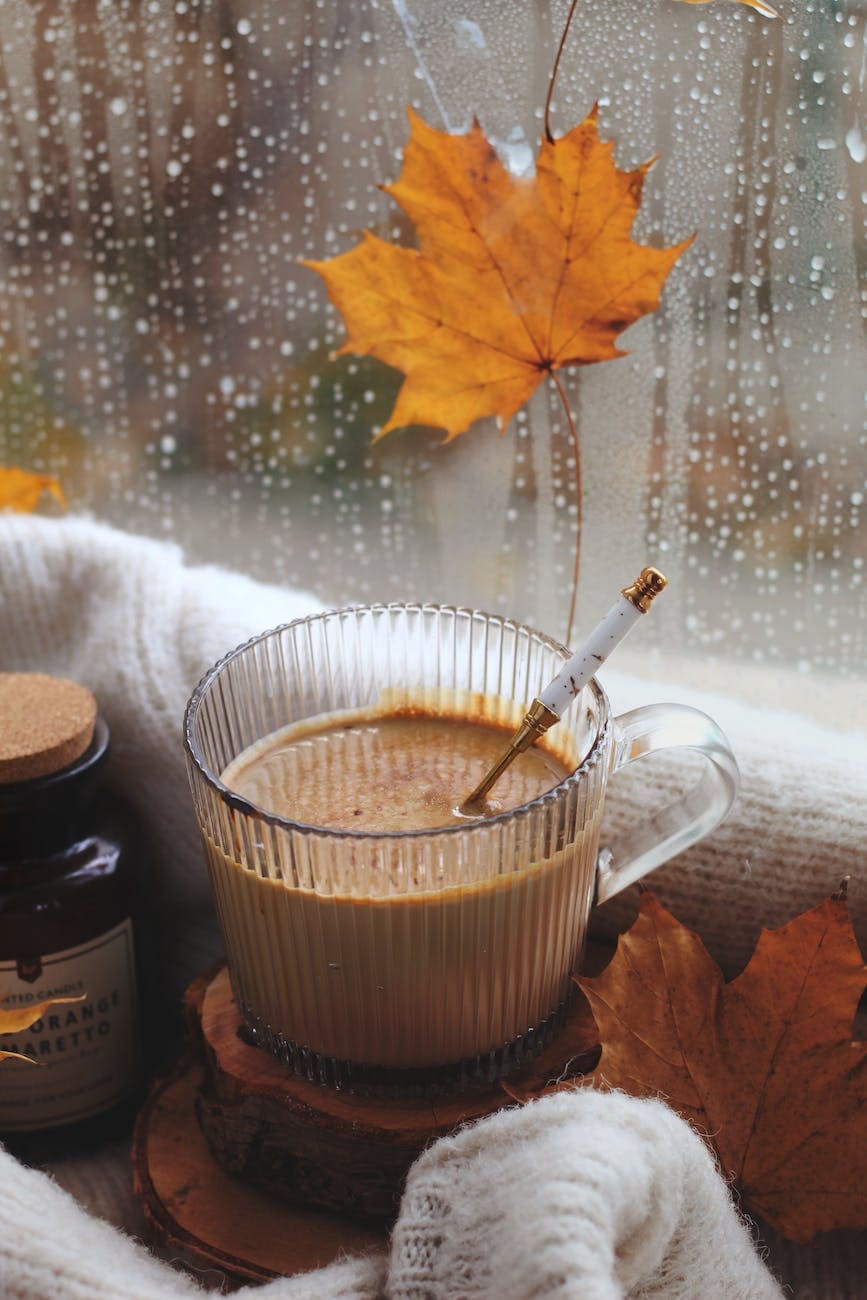 autumn windowsill decoration with coffee