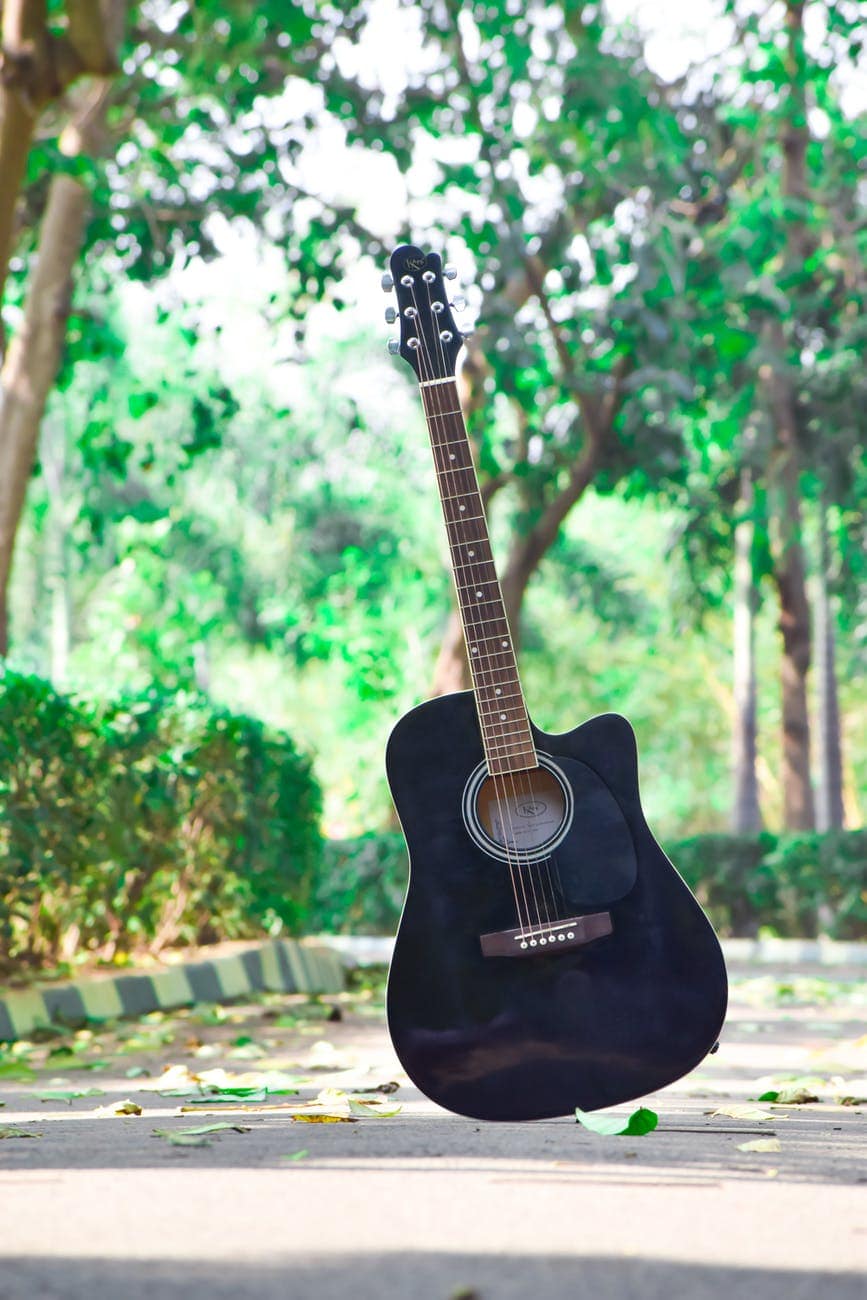 black acoustic guitar