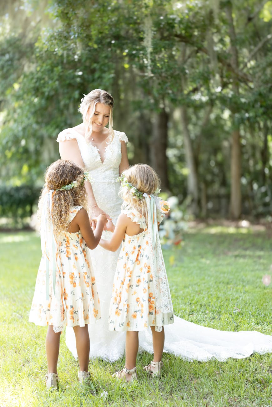 bride standing with two kids