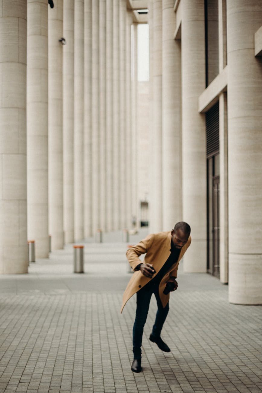 man running towards the building