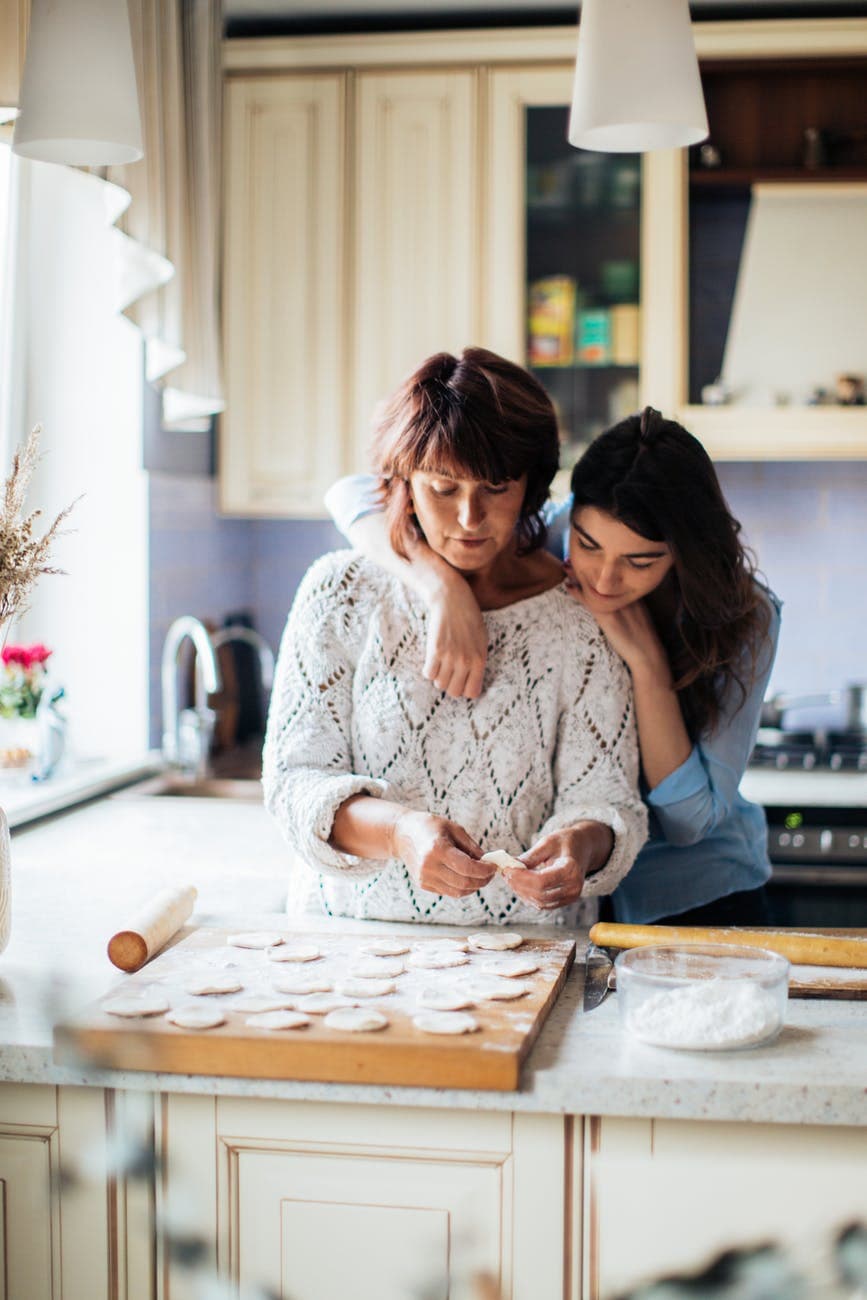 women making pelmeni