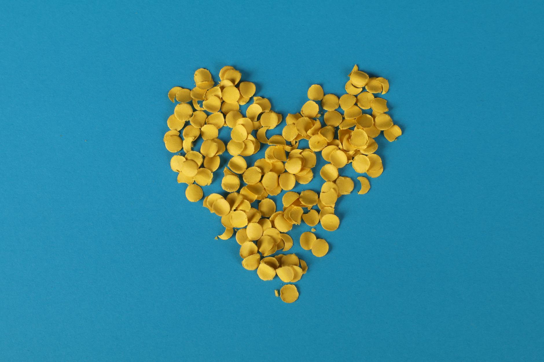 yellow confetti on blue background