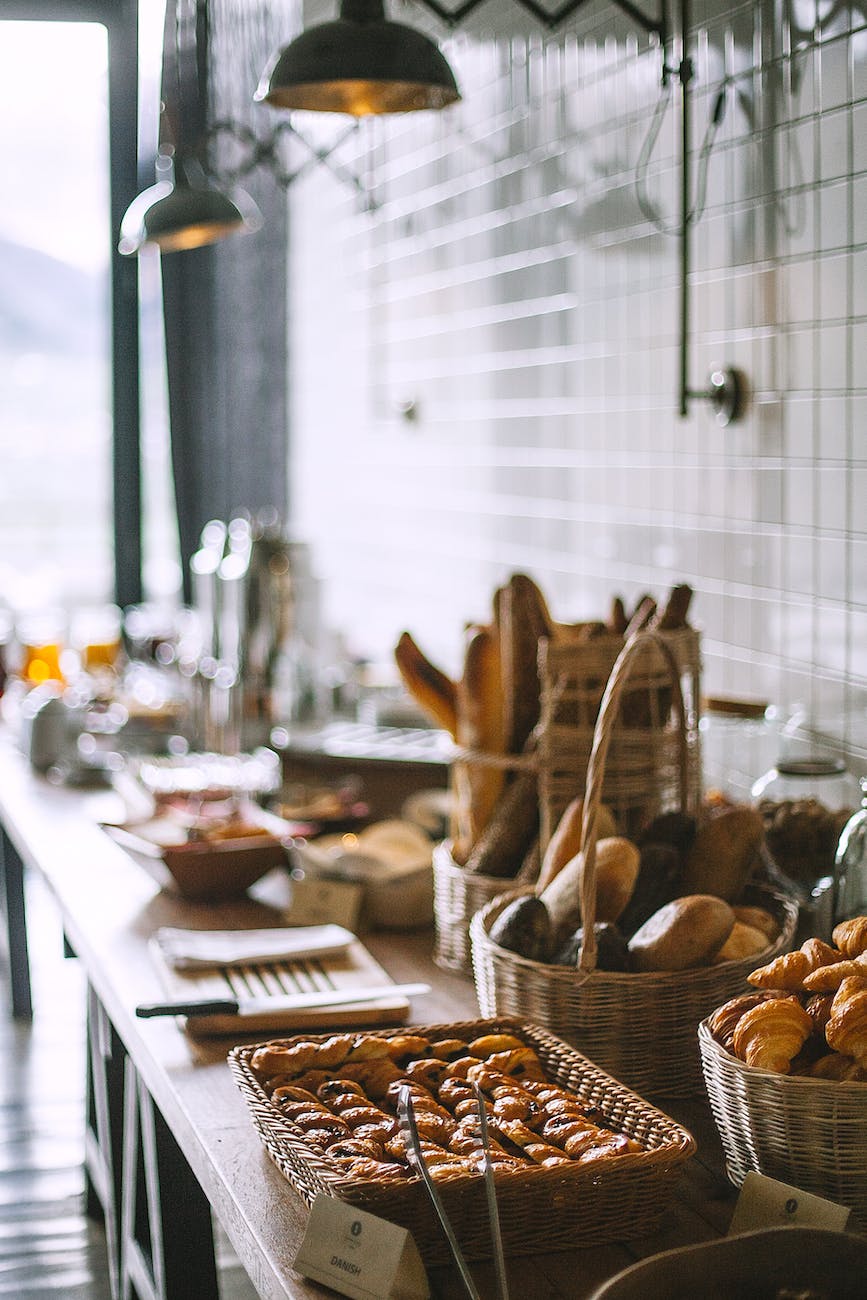 baked pies and bread in baskets