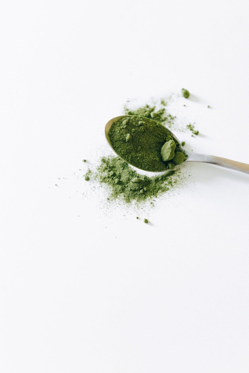 matcha powder on a spoon