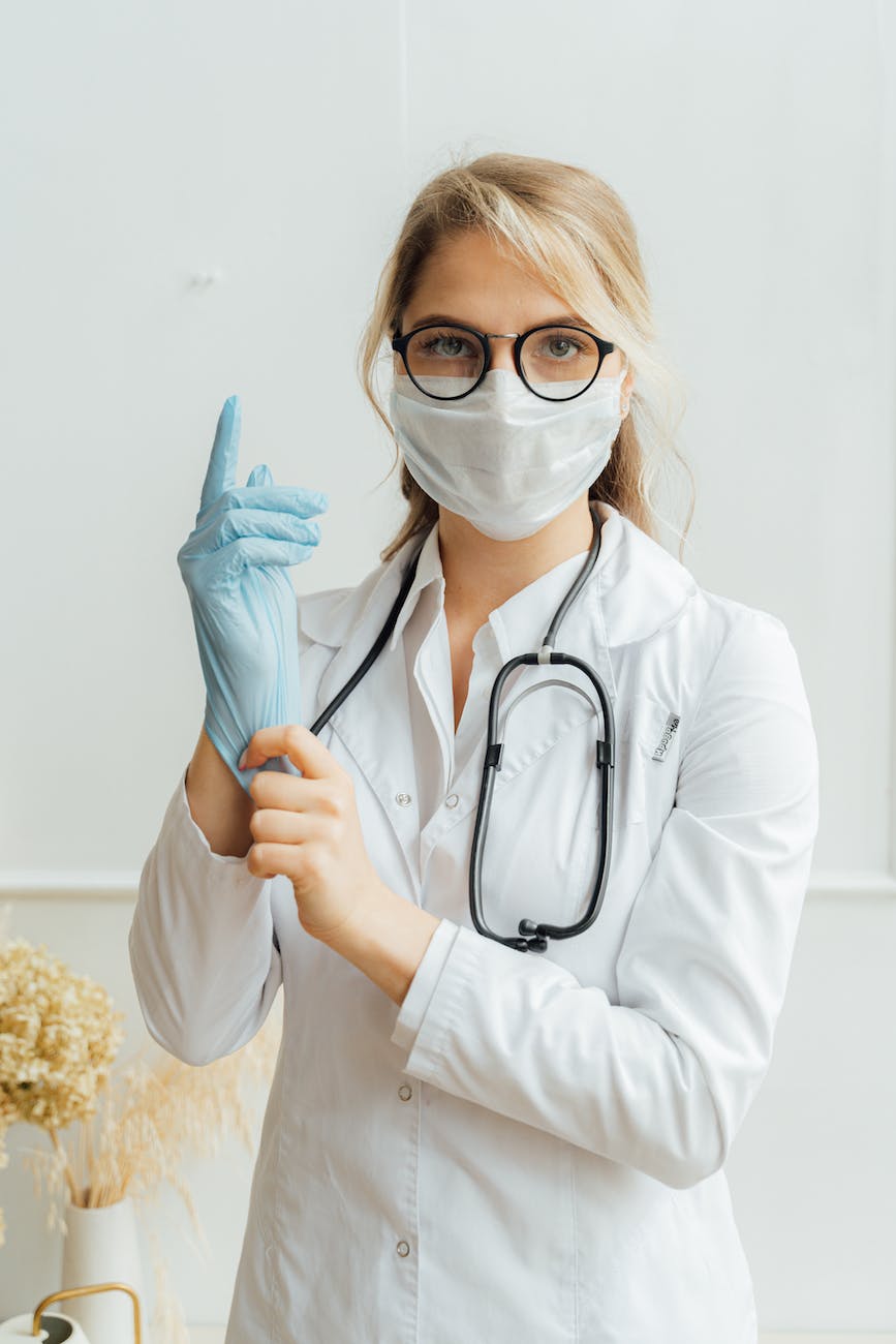 doctor wearing latex gloves