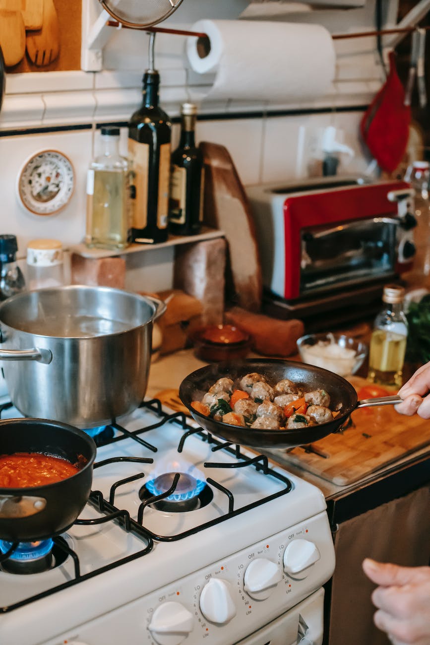 crop person preparing lunch in house kitchen