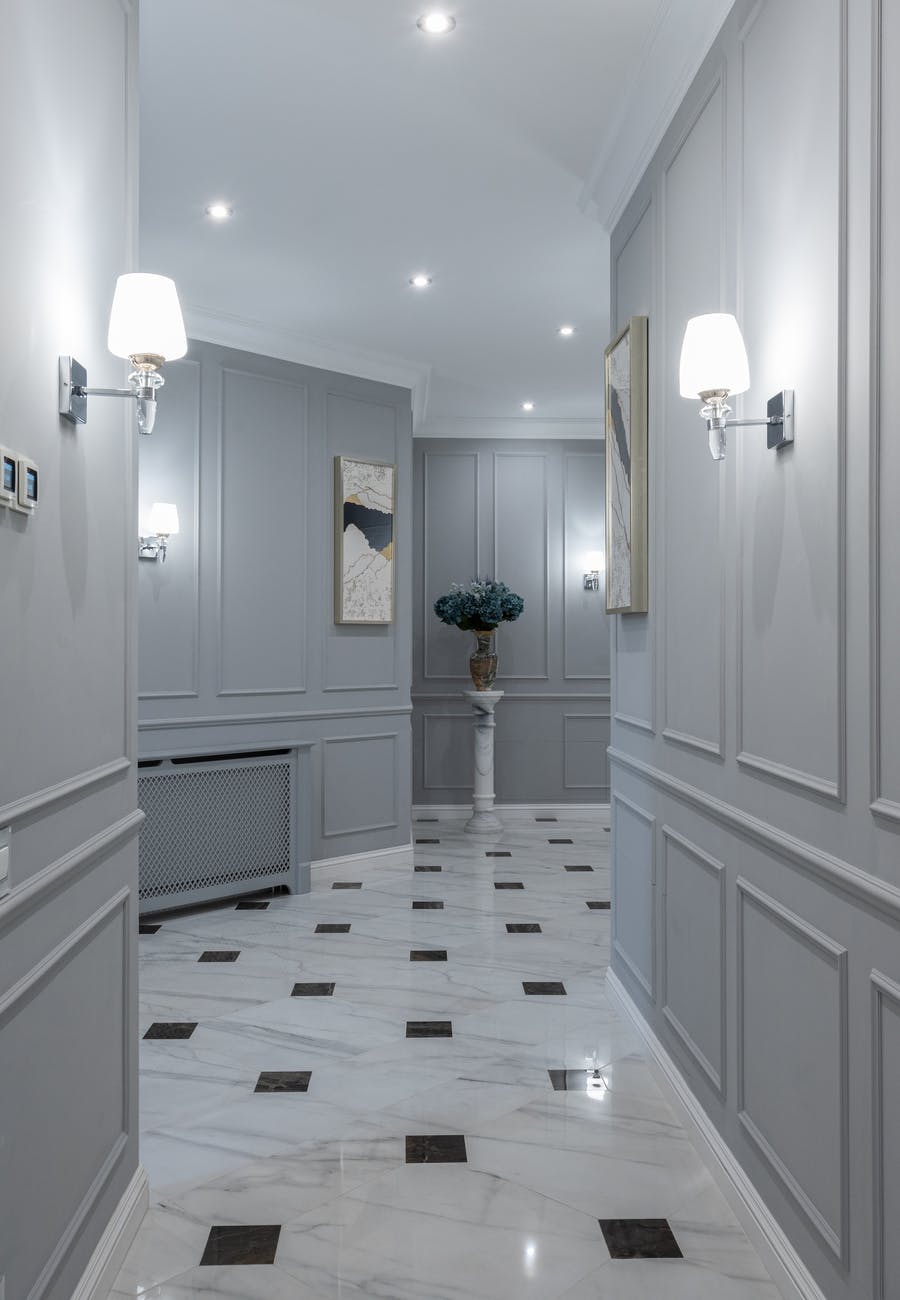 classic styled lamps decorating corridor of luxury villa