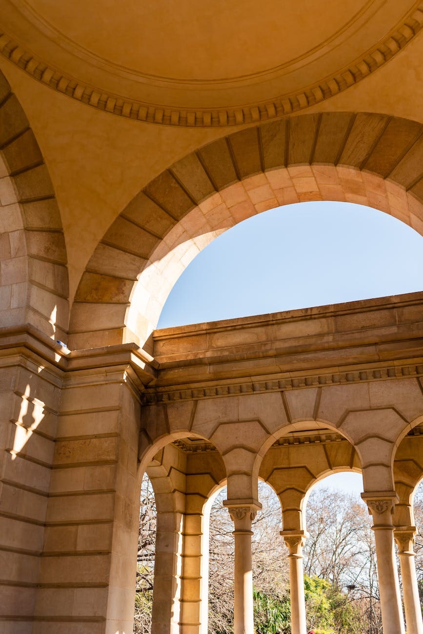 arched passage with columns in aged building