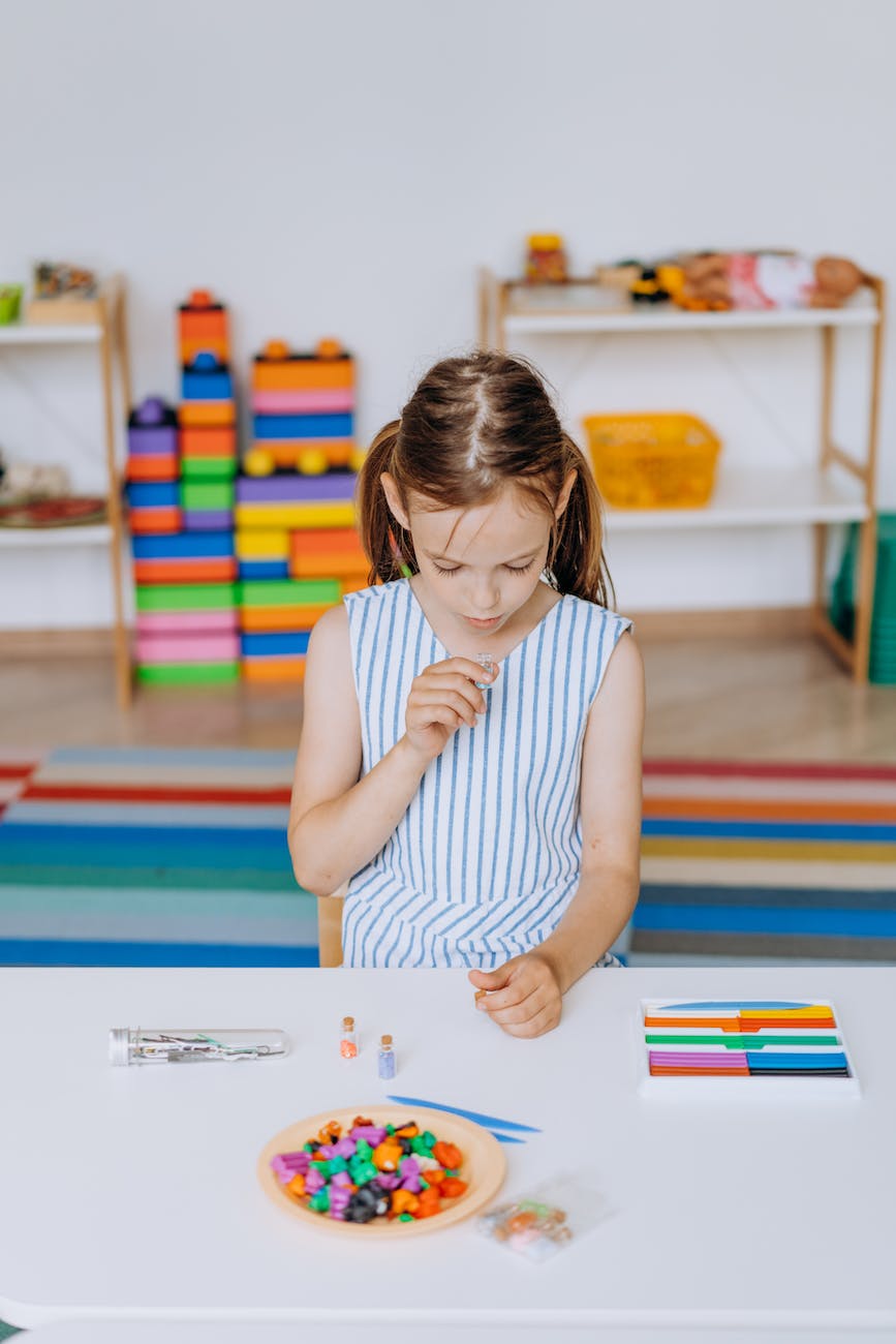 a girl doing a school activity
